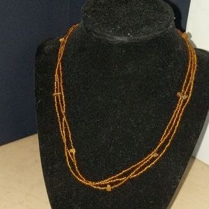Gold and wood beads necklace
